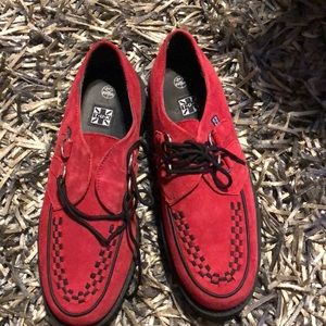 Red and black platform shoes